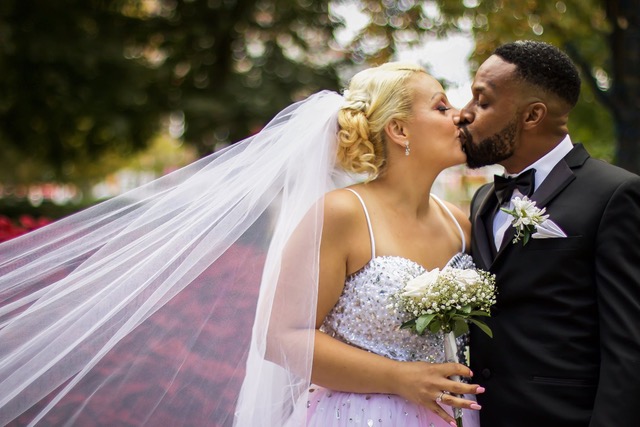 A kiss from the Bride and Groom.